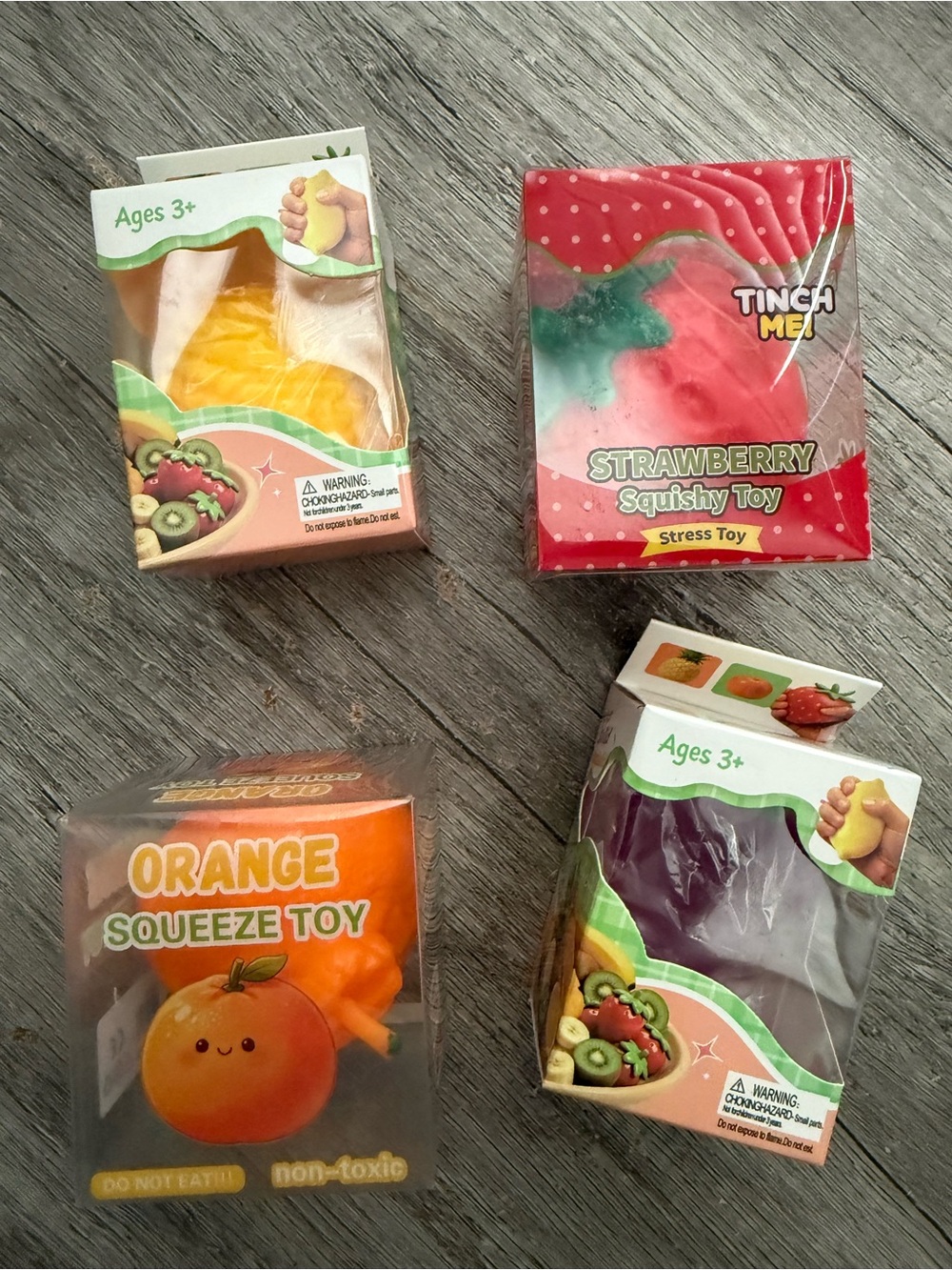New in box Crunchy SQUISHY Bundle of 4 fruits pineapple strawberry orange grape